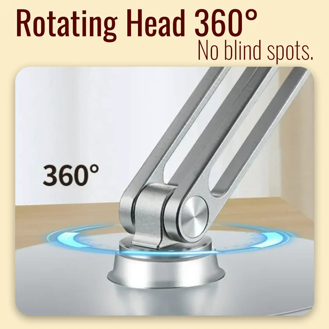 Metallic lamp with rotating head feature on a beige background